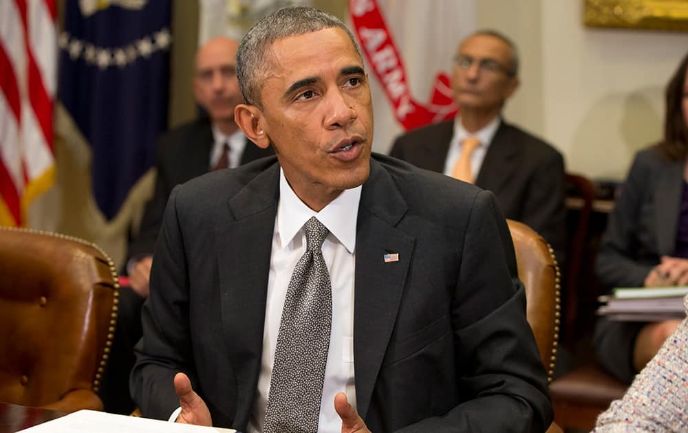 President Barack Obama meets with members of his national security team and senior staff to receive an update on the Ebola outbreak in West Africa.