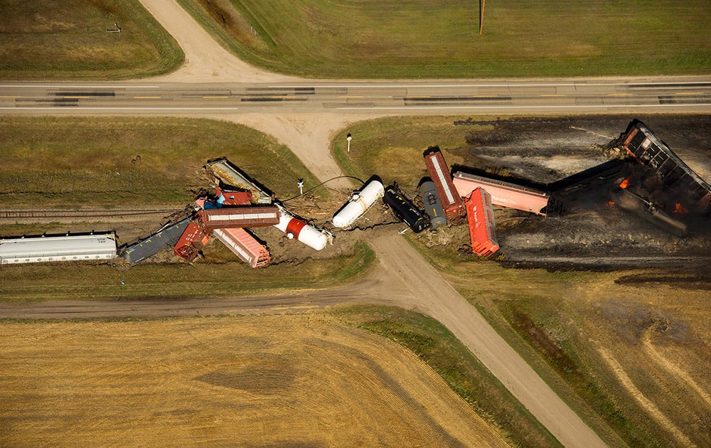 This aerial photo shows a Canadian National Railway Company freight train carrying dangerous goods that derailed and caught fire near the town of Wadena, Saskatchewan.