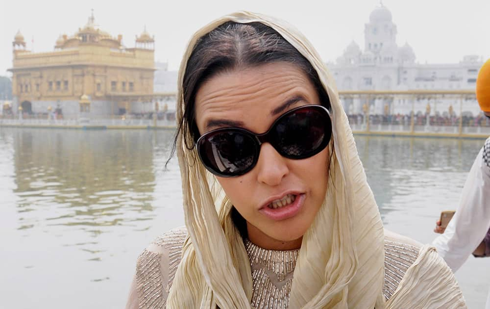 Bollywood actress Neha Dhupia during her visit to the Golden Temple as she arrived there to promote her upcoming film, 21 Topon ki Salami in Amritsar.