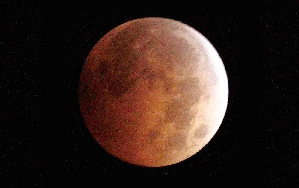 The Blood Moon, created by the full moon passing into the shadow of the earth during a total lunar eclipse, as seen from Monterey Park, Ca.