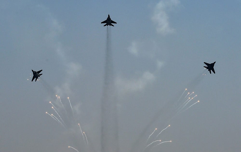 Fighter aircrafts present an air show during the 82nd Air Force Day function at Air Force Station Hindon in Ghaziabad.