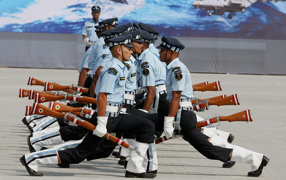 Air Force personnel perform a drill during the full dress rehearsal for the Air Force Day Parade, at Air Force Station Hindon in Ghaziabad.