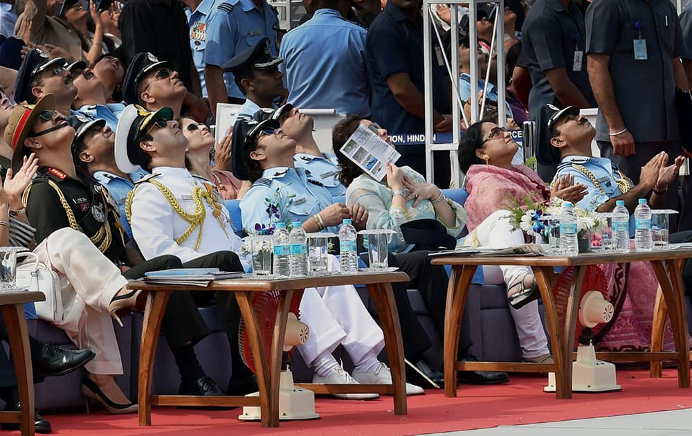 Sachin Tendulkar, cricket legend and honorary Group Captain in IAF and his wife Anjali with Air Chief Marshal Arup Raha, Navy Chief Admiral RK Dhowan and Army chief Gen Dalbir Singh Suhag during the 82nd Air Force Day function at Air Force Station Hindon in Ghaziabad.