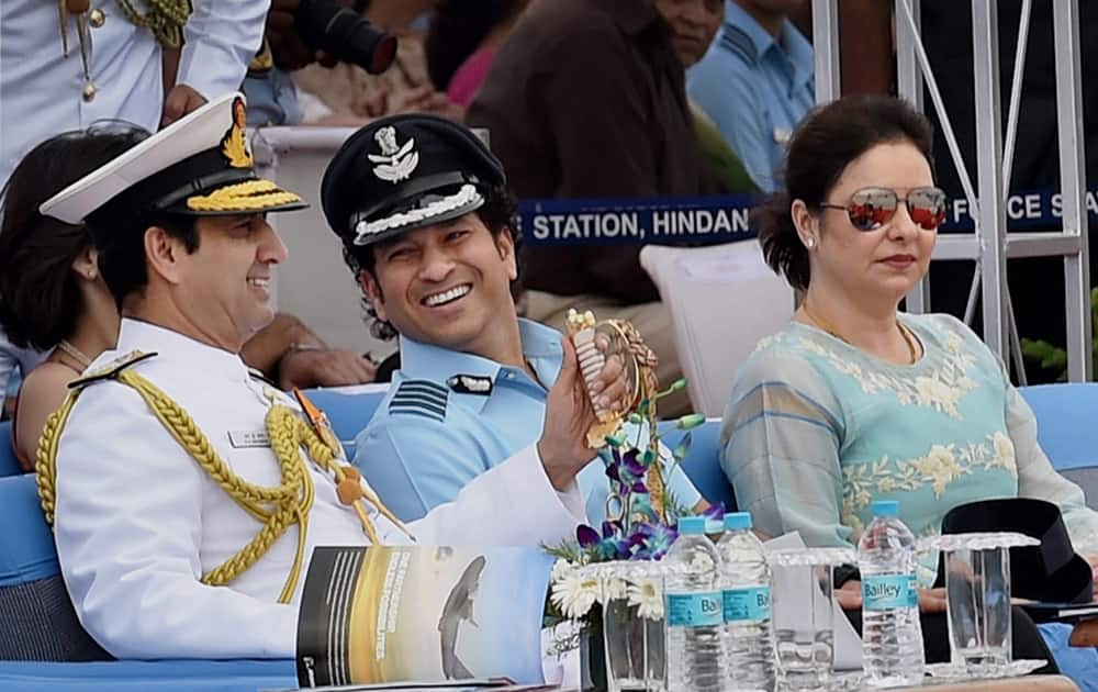 Sachin Tendulkar, cricket legend and honorary Group Captain in IAF and his wife Anjali with Navy Chief Admiral RK Dhowan during the 82nd Air Force Day function at Air Force Station Hindon in Ghaziabad.