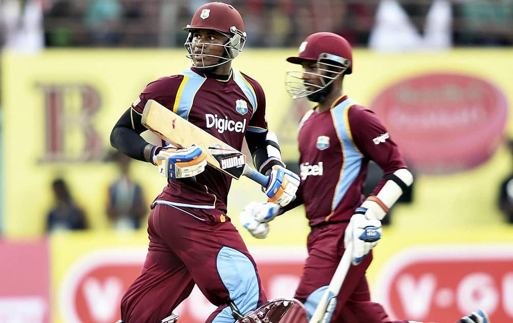 West Indies cricketer Marlon Samuels and D Ramdin during the first ODI match against India at Jawaharlal Nehru Stadium in Kochi.