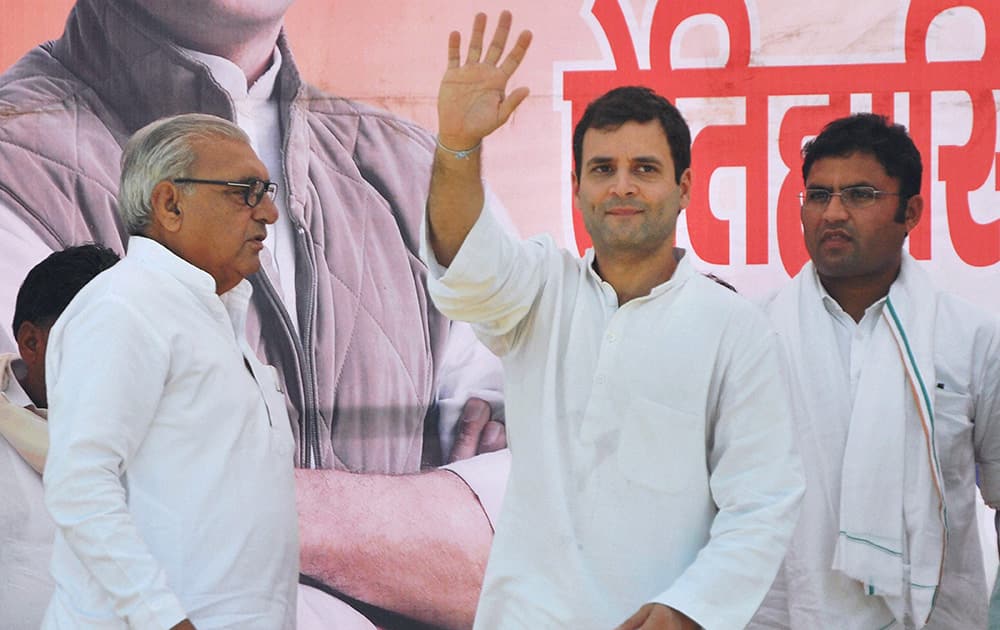 Congress Vice President Rahul Gandhi and Haryana Chief Minister Bhupinder Singh Hooda at an election campaign rally in Ferozepur Jhirka in Mewat.