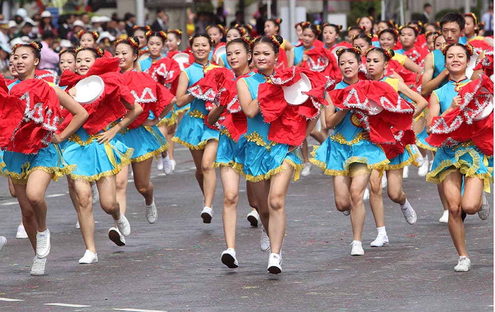 Young dancers perform during National Day celebrations in Taipei.