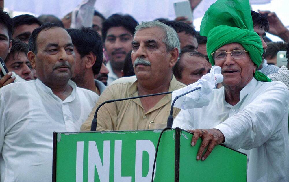 Indian National Lok Dal Supremo Om Prakash Chautala addresses an election rally in Kurukshetra.