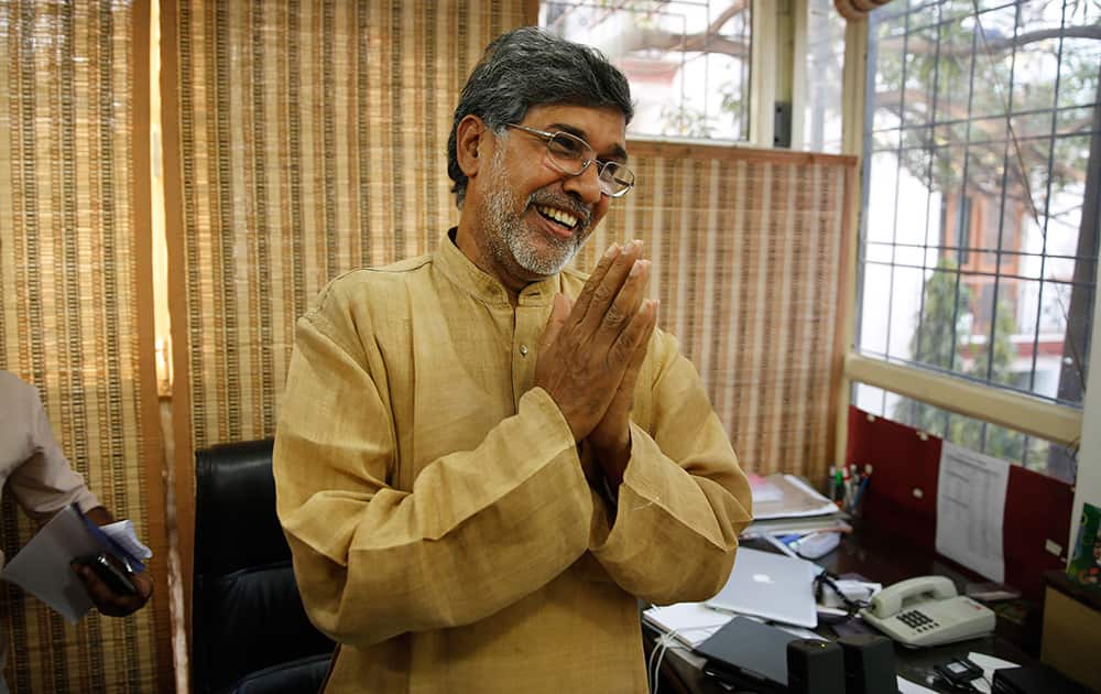 Indian children's rights activist Kailash Satyarthi gestures as he addresses the media at his office in New Delhi. Malala Yousafzai of Pakistan and Satyarthi of India jointly won the Nobel Peace Prize for risking their lives to fight for children's rights.