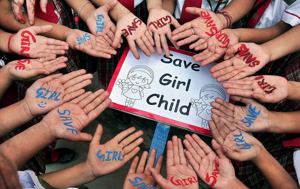 School children take part in an awareness campaign on eve of Save Girl Child day in Bikaner.