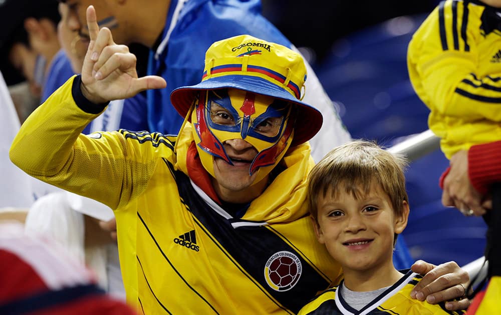 Spectators pose for a photograph prior to the start of an international soccer friendly match between Colombia and El Salvador at Red Bull Arena.