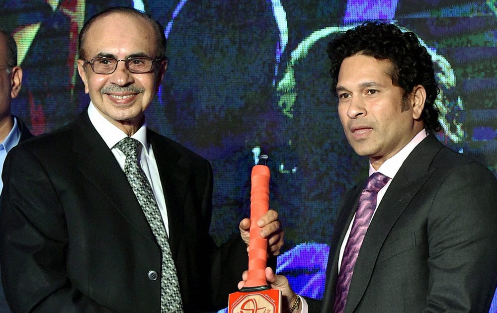 Cricket legend Sachin Tendulkar and Godrej Group, Chairman Adi Godrej during the Compliance Crusader Award function in Mumbai.