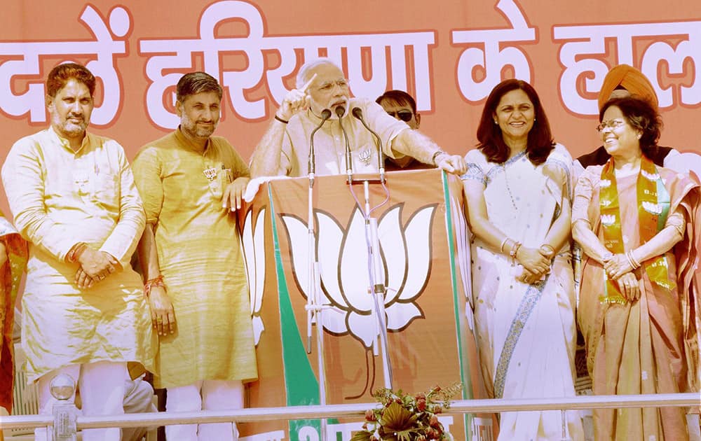 Prime Minister Narendra Modi addresses an election campaign rally for BJP candidates in Sirsa.