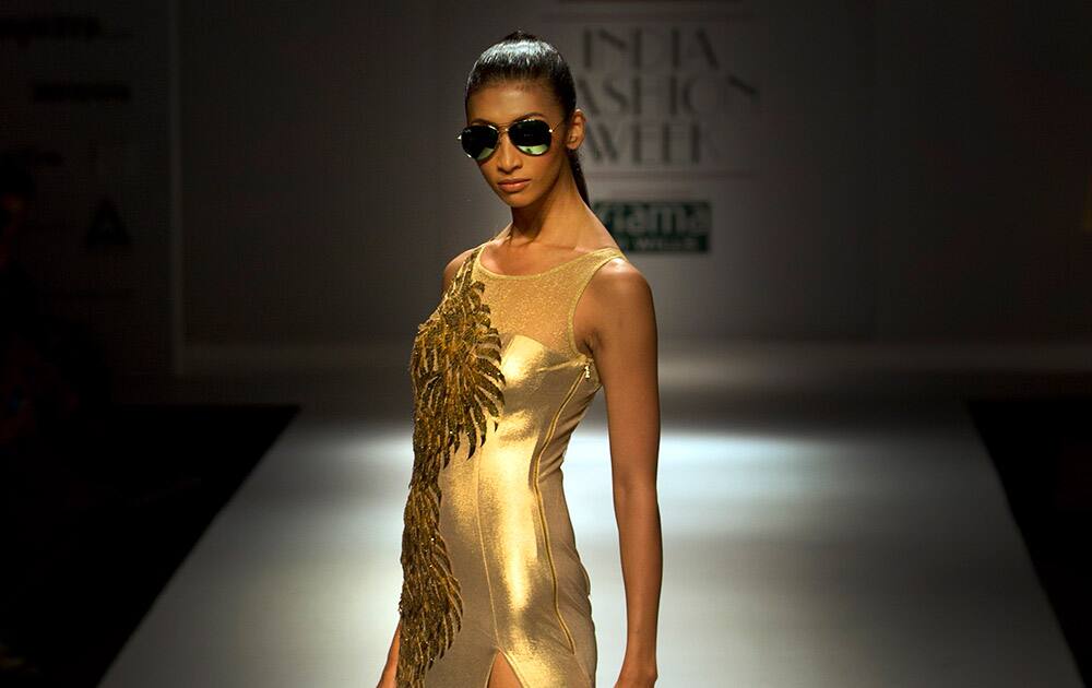 An Indian model displays a creation by designer Ankita during Wills Lifestyle India Fashion Week, in New Delhi.