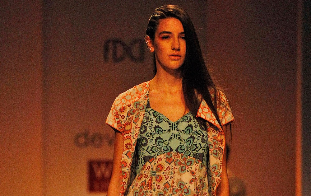 An Indian model displays a creation by designers Dev r Nil during Wills Lifestyle India Fashion Week, in New Delhi.