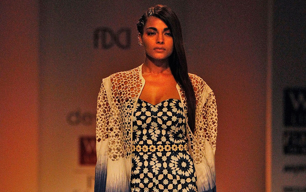 An Indian model displays a creation by designers Dev r Nil during Wills Lifestyle India Fashion Week, in New Delhi.