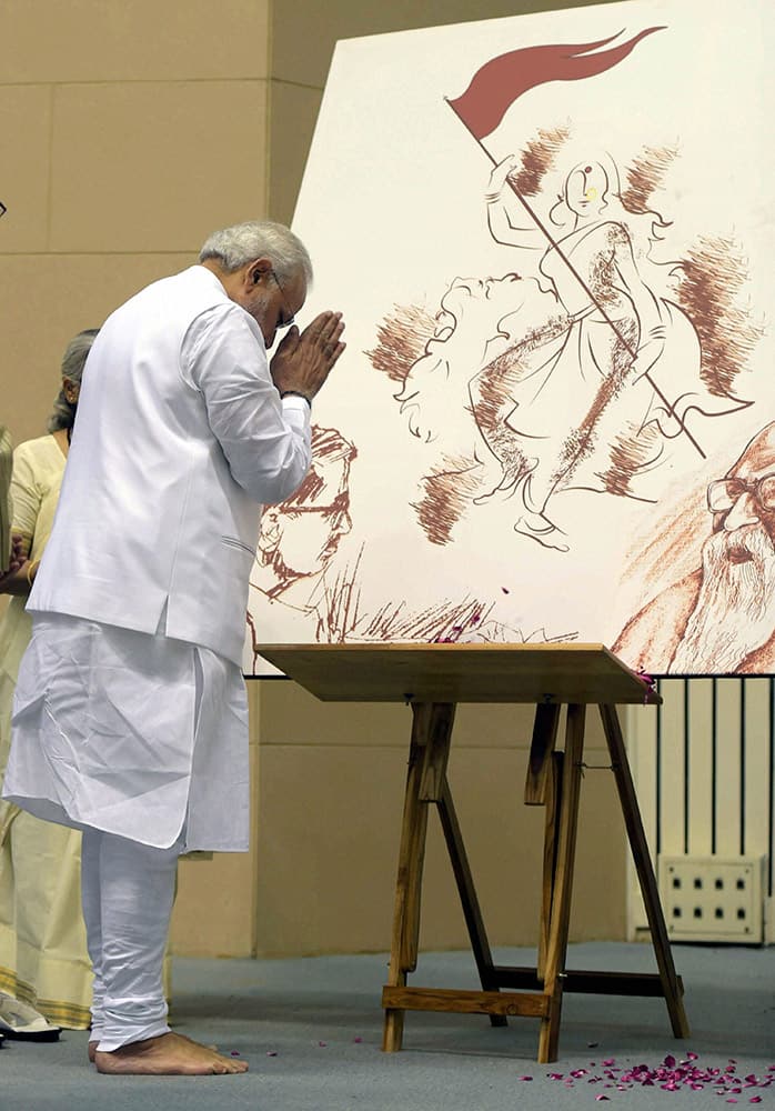 Prime Minister Narendra Modi paying tribute at the release of the book Virat-Purush Nanaji social activist and one of the founder members of Bharatiya Jan Sangh, which has been compiled in six volumes by the Deendayal Research Institute during a function in New Delhi.	