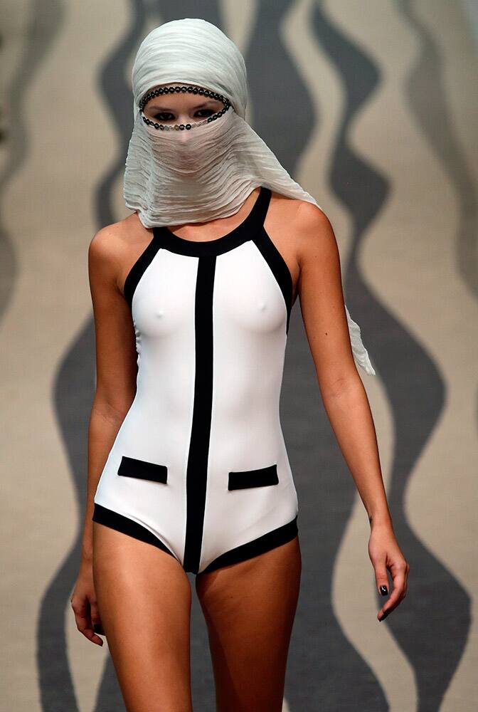 A model wears a creation by Portuguese designer Filipe Faisca during the ModaLisboa fashion week, in Lisbon, Portugal.