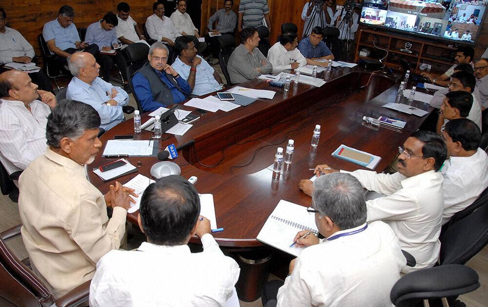 AP Chief Minister N Chandra Babu Naidu reviews the preparedness for Cyclone HudHud, in Hyderabad.
