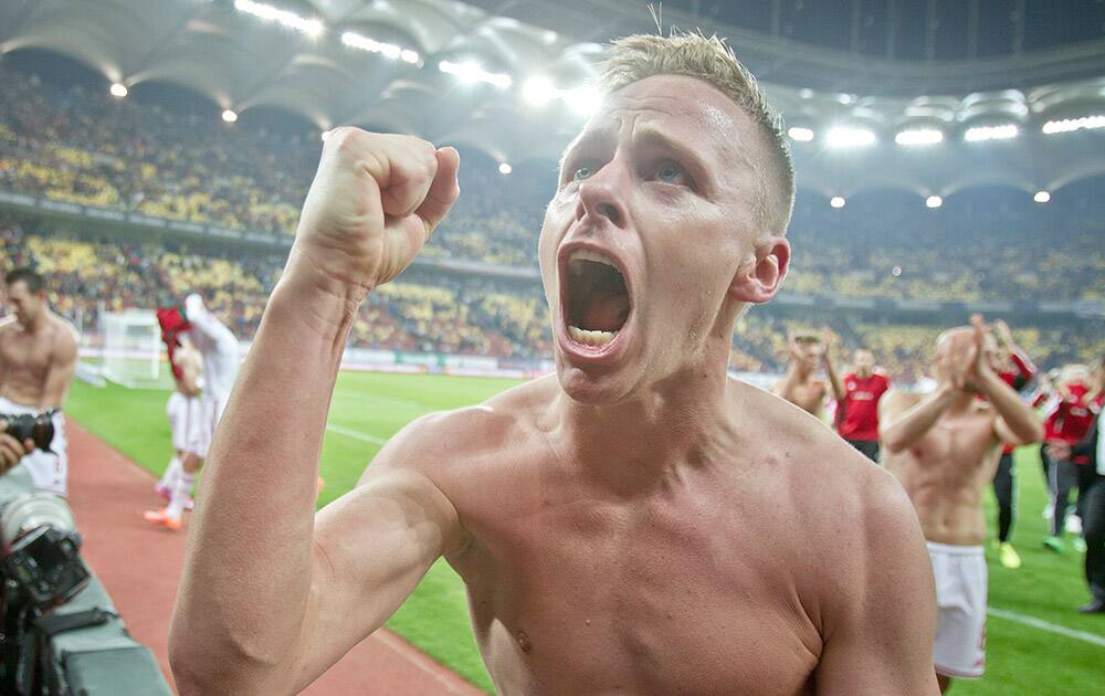 Hungary's Balazs Dzsudzsak celebrates at the end of the Group F, Euro 2016 qualifying match between Romania and Hungary, at the National Arena stadium, in Bucharest, Romania.