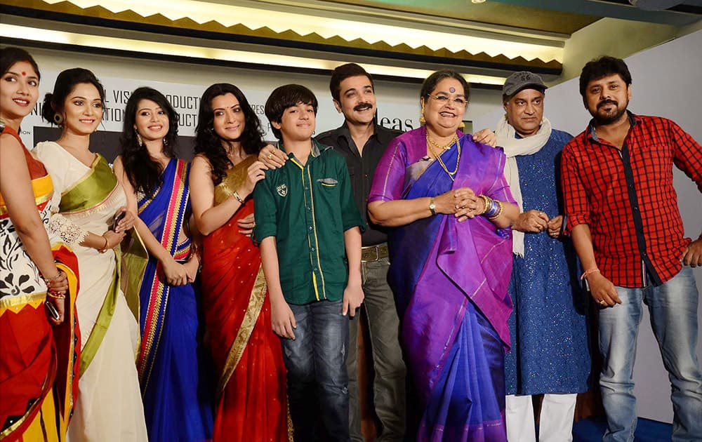 Bengals superstar Prosenjit Chatterjee with Pop icon Usha Uthup, film star Arpita Chatterjee, film Director Raza Chandra and other artists during a promotional event of their Bengali film Force in Kolkata.