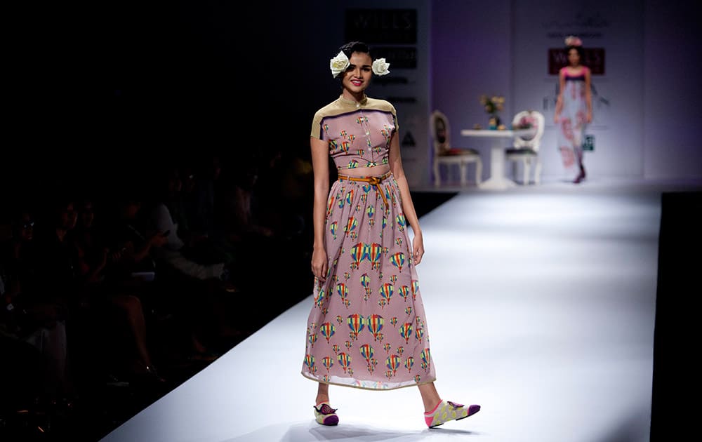 An Indian model displays a creation by designer Nida Mahmood during Wills Lifestyle India Fashion Week, in New Delhi.