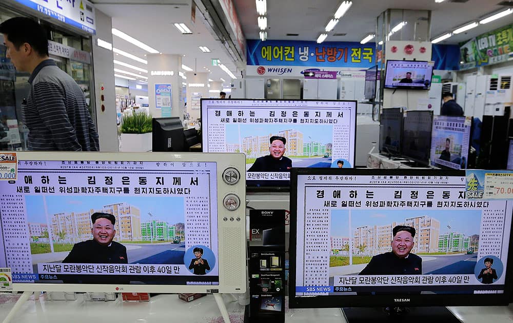 TV monitors show a news report about North Korean leader Kim Jong Un, at an electronic shop, South Korea.