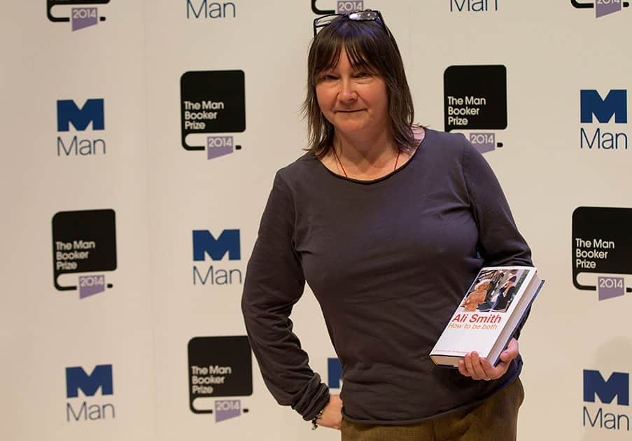 Man Booker prize 2014 nominee British author Ali Smith holds her book 'How to be Both' during a photocall for the Man Booker Prize for fiction 2014 at the Royal Festival Hall in London.