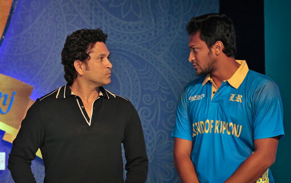 India’s cricket icon Sachin Tendulkar, left, speaks to Bangladeshs Sakib Al Hasan during a promotional event in Dhaka, Bangladesh. Tendulkar Tuesday unveiled the logo of Dhaka Premier Division Cricket League champions `Legends of Rupganj.`
