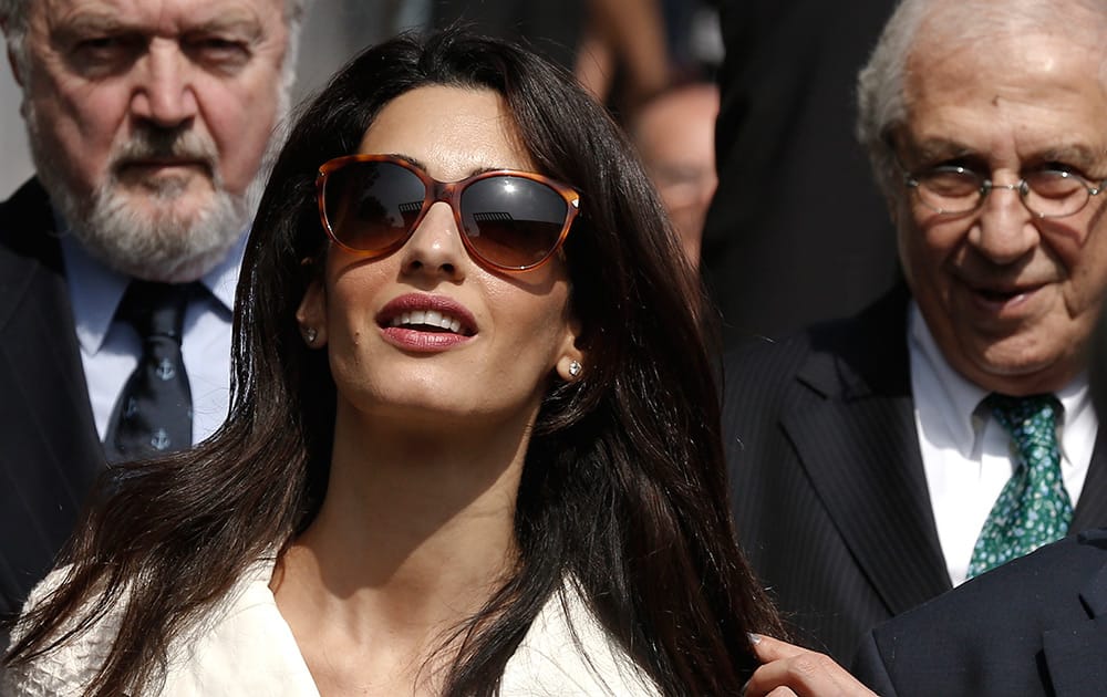 Lawyer Amal Clooney, arrives at Acropolis Museum in Athens. Lawyers Geoffrey Robertson, Norman Palmer and Amal Clooney arrived Monday to Greece on a four-day visit to meet government officials, including Prime Minister Antonis Samaras, and advise on Greece's quest to have the Parthenon Marbles returned to Athens.