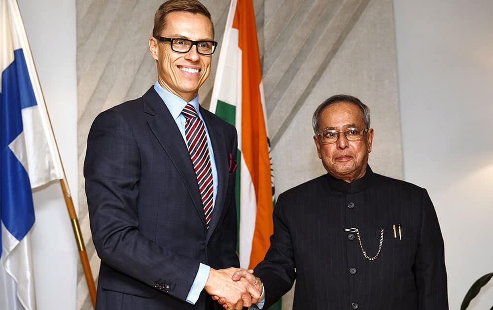 Indian President Pranab Mukherjee, right, meets with Finland's Prime Minister Alexander Stubb in Helsinki.