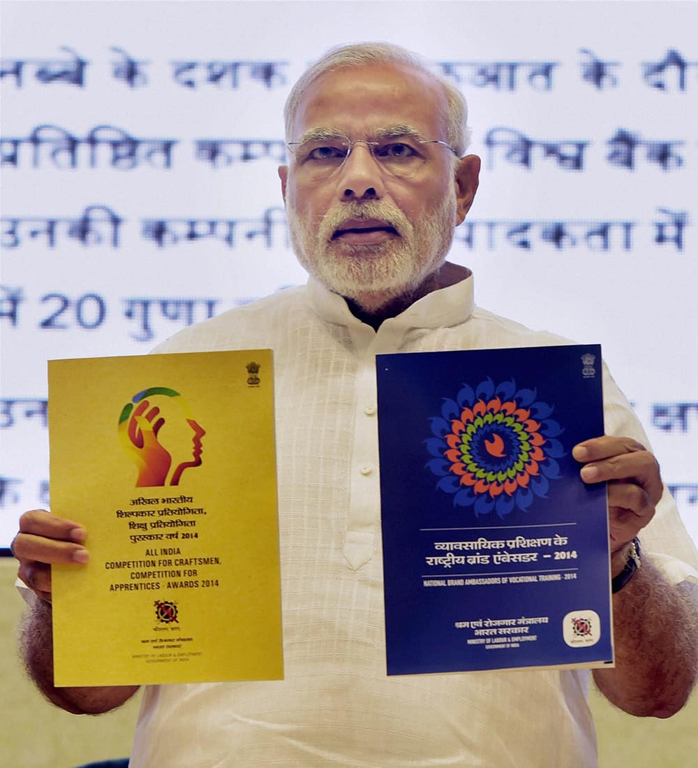 Prime Minister Narendra Modi releasing publications at the launch of Pandit Deendayal Upadhyay Shramev Jayate scheme in New Delhi.