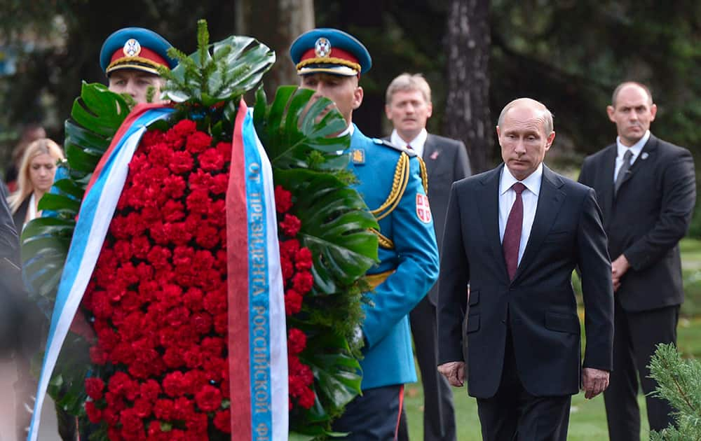 Russian President Vladimir Putin, lays a wreath at a monument to Soviet soldiers in Belgrade, Serbia.