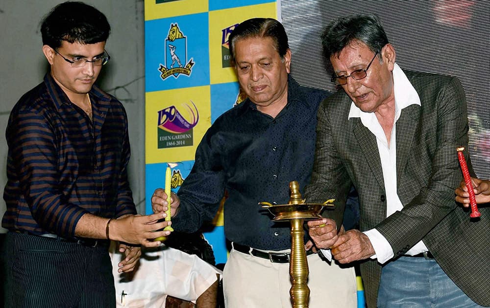 Former Indian Cricket all-rounder Salim Durani and Chandu Borde with Sourav Ganguly, lights the lamp, celebrating 150 years of Eden Gardens in Kolkata.