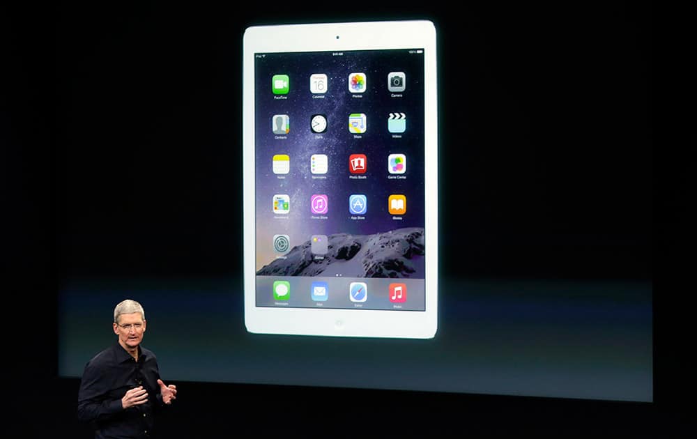 Apple CEO Tim Cook introduces the new Apple iPad Air 2 during an event at Apple headquarters.