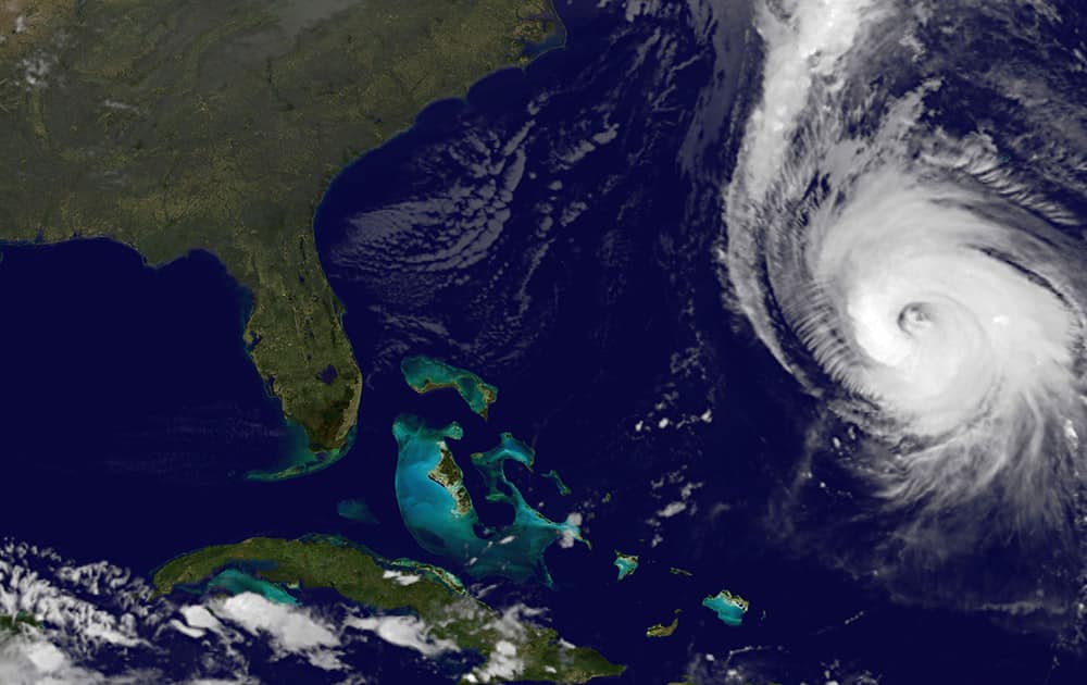 This image provided by NOAA taken at 11:15 p.m. EDT, shows Hurricane Gonzalo, as it approaches Bermuda. At 11 p.m. Gonzalo was approximately 340 miles south-southwest of Bermuda with maximum sustained winds of 140 mph moving north-northeast at 14 mph according to the National Hurricane Center. 
