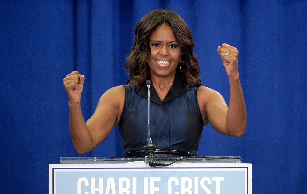 First lady Michelle Obama addresses the crowd during a campaign rally for Democratic gubernatorial candidate Charlie Crist in Orlando, Fla.