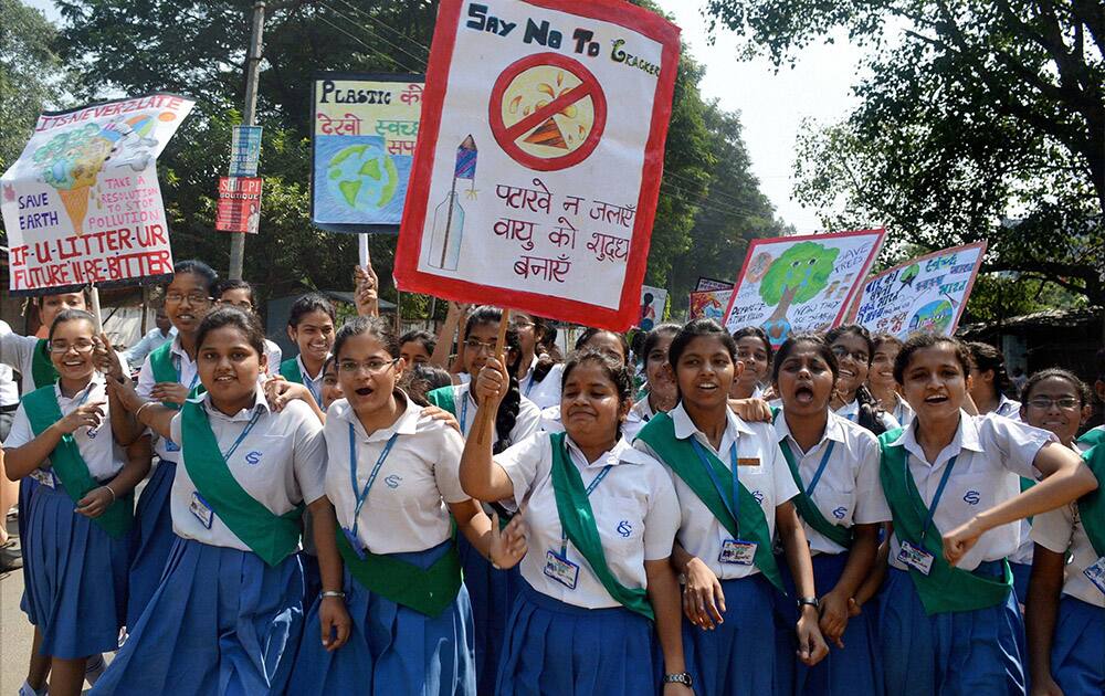 Children take part in an awareness campaign for safe Diwali celebrations in Dhanbad.