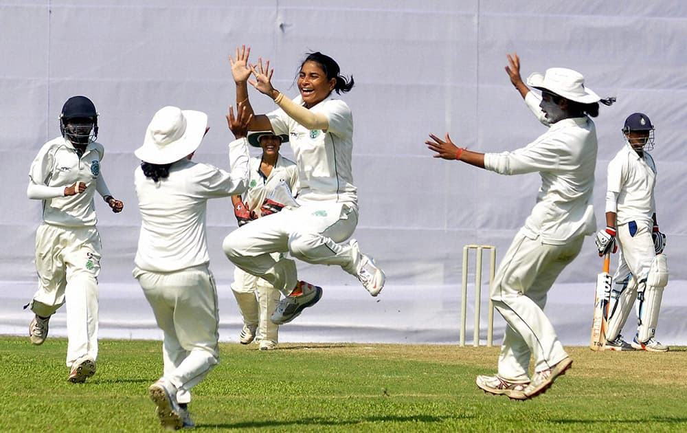 Assam players celebrate after taking a Tripura wicket during the U-19 Women East Zone Cricket League, at Nehru Stadium in Guwahati.