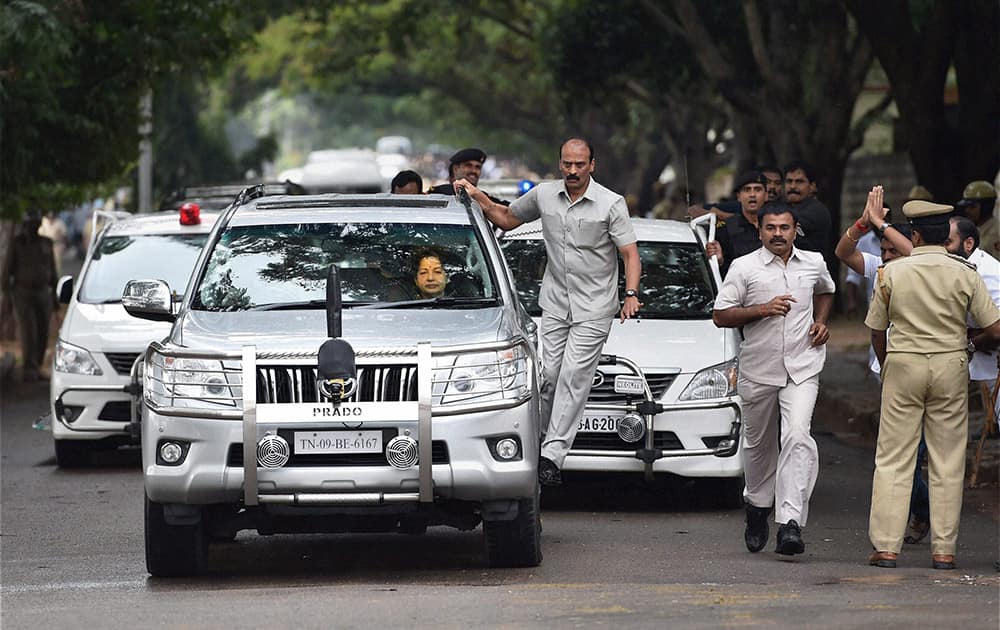 Jayalalithaa leaves from the Central jail after her release on bail granted by the Supreme Court, in Bengaluru.