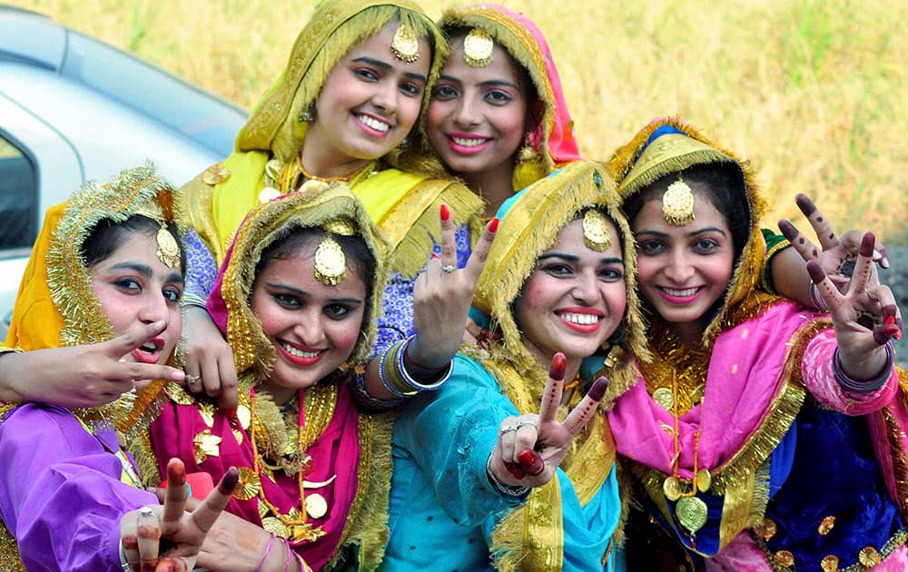 Girls from Punjabi University celebrates victory during the inaugural day of Punjabi University Zonal Youth Festival at Kauli in Patiala.