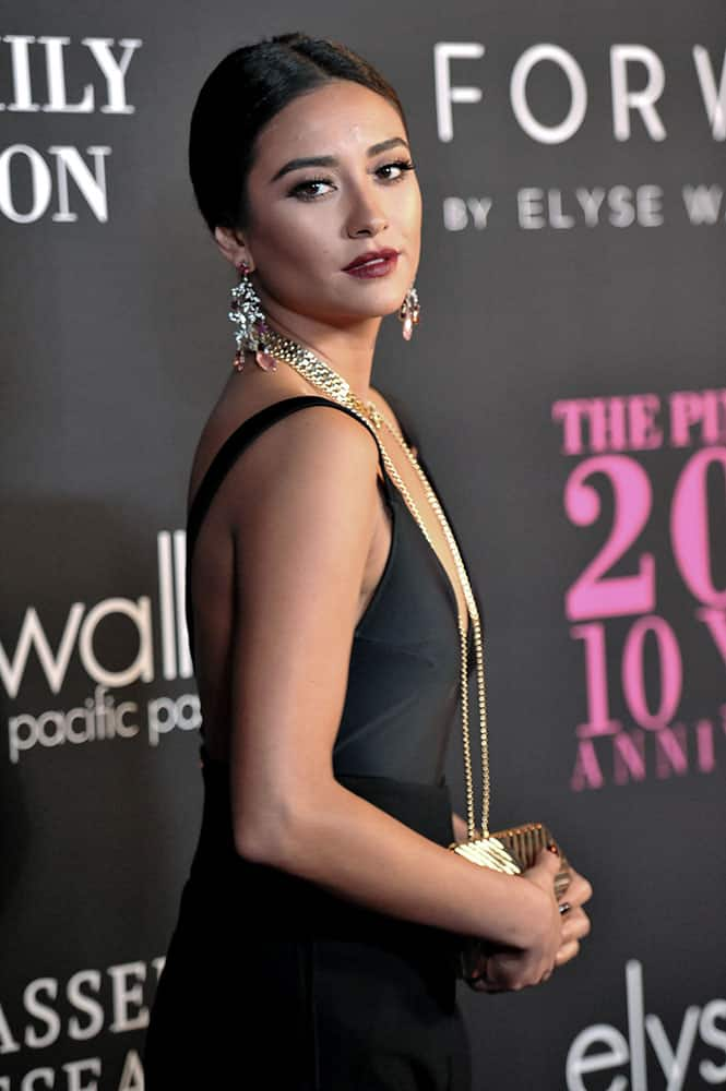 Shay Mitchell arrives at Elyse Walker's 10th Annual Pink Party, in Santa Monica, Calif. 