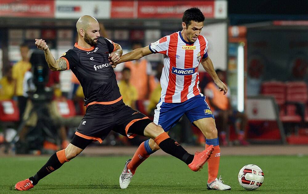 Atletico De Kolkata and Delhi Dynamos FC Players in action during their ISL Match in Kolkata.