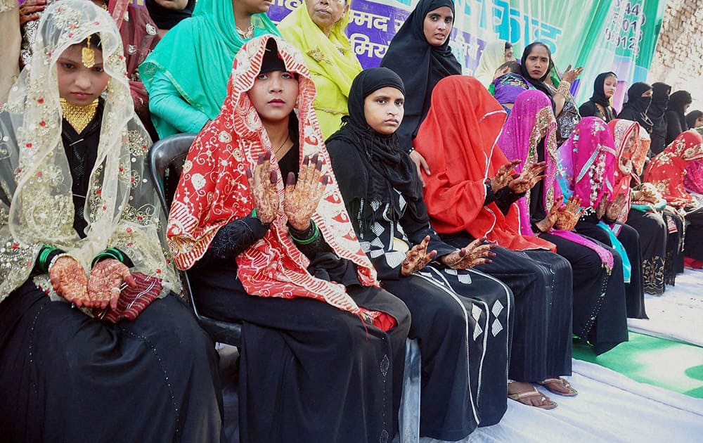 Muslim brides at a mass marriage ceremony in Moradabad.