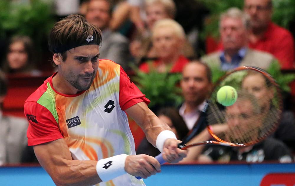 David Ferrer of Spain returns the ball to Andy Murray of Britain during their final match at the Erste Bank Open tennis tournament in Vienna, Austria.