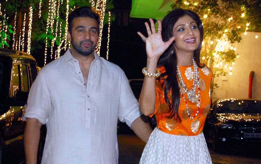 Bollywood actress Shilpa Shetty and her husband Raj Kundra during their Diwali party in Mumbai.