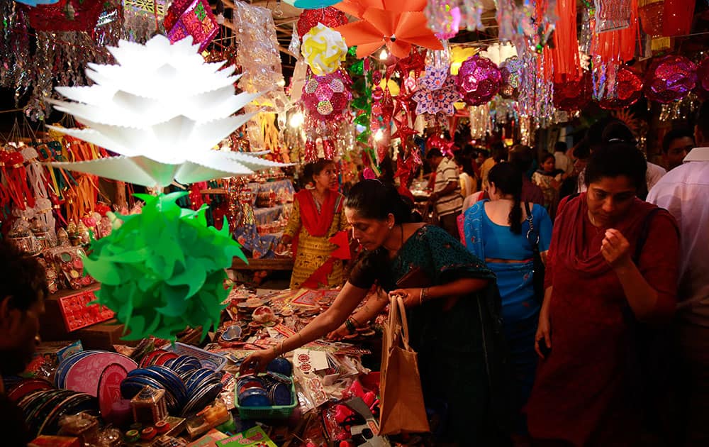 Indians buy lanterns and lamps from roadside stalls ahead of Diwali, the Hindu festival of lights in Mumbai.