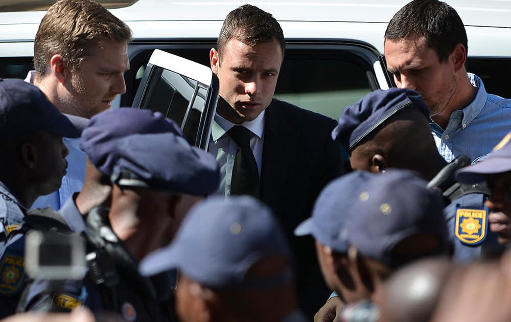 Oscar Pistorius, arrives outside the court in Pretoria, South Africa. Pistorius received a five-year sentence for culpable homicide by judge Thokozile Masipais for killing his girlfriend Reeva Steenkamp last year.