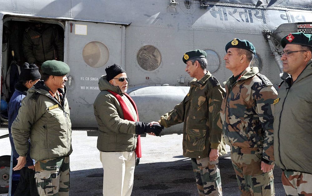Prime Minister Narendra Modi is received on his arrival at Siachen Base Camp on Thursday. Army Chief Gen Dalbir Singh is also seen.