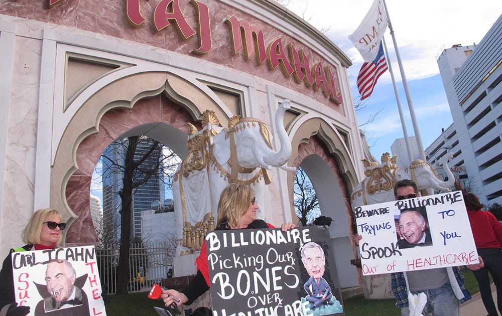 Casino union workers demonstrate outside the Trump Taj Mahal Casino Resort in Atlantic City N.J.